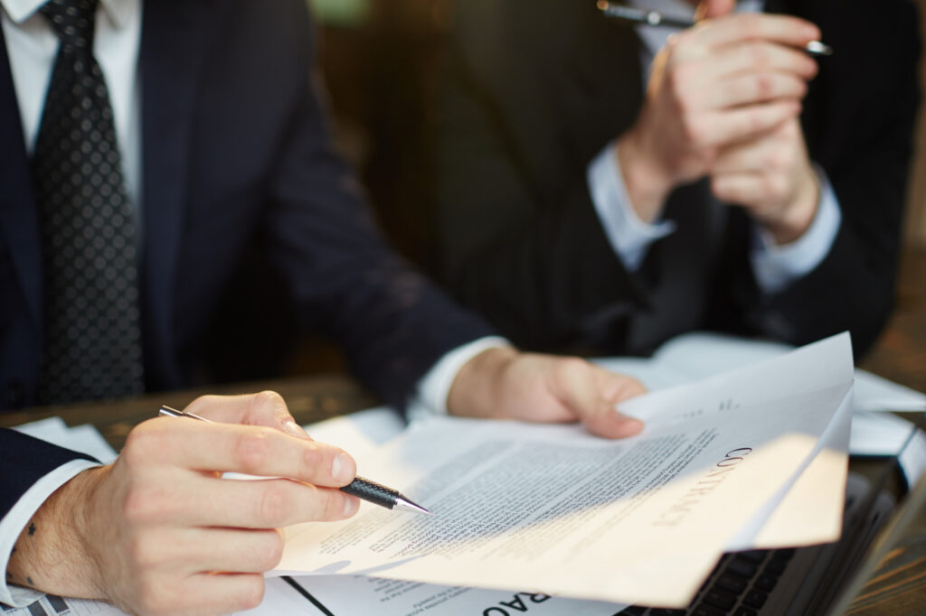 Businessman processing legal documents for businesses