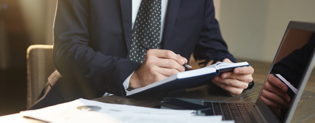 Businessman processing legal documents for businesses