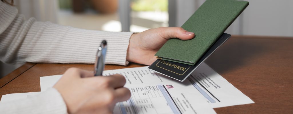 Women giving the passport and visa to the owner.