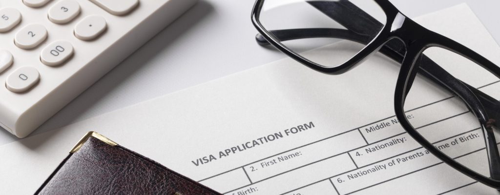 9G Visa Application flat-lay-of-9G-visa-application-assortment
